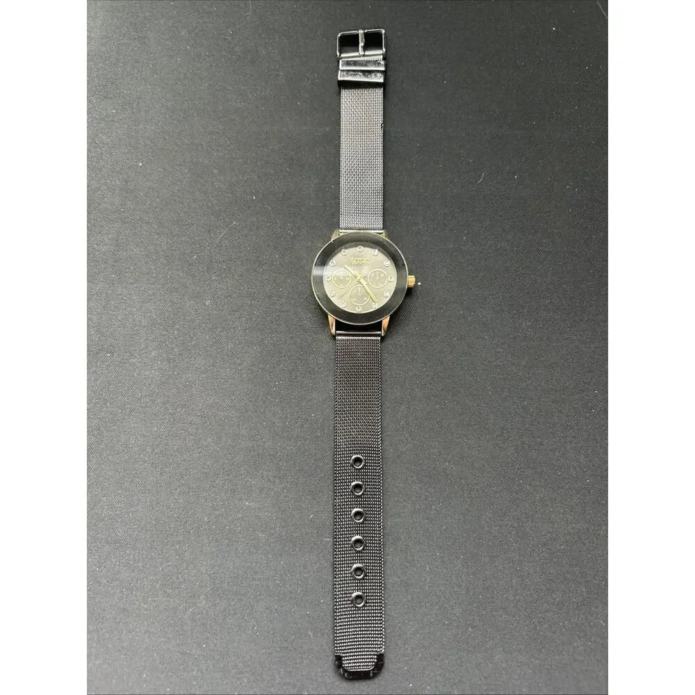 American Exchange Gold Tone Case Black Dial And Bezel Women’s Quartz Watch